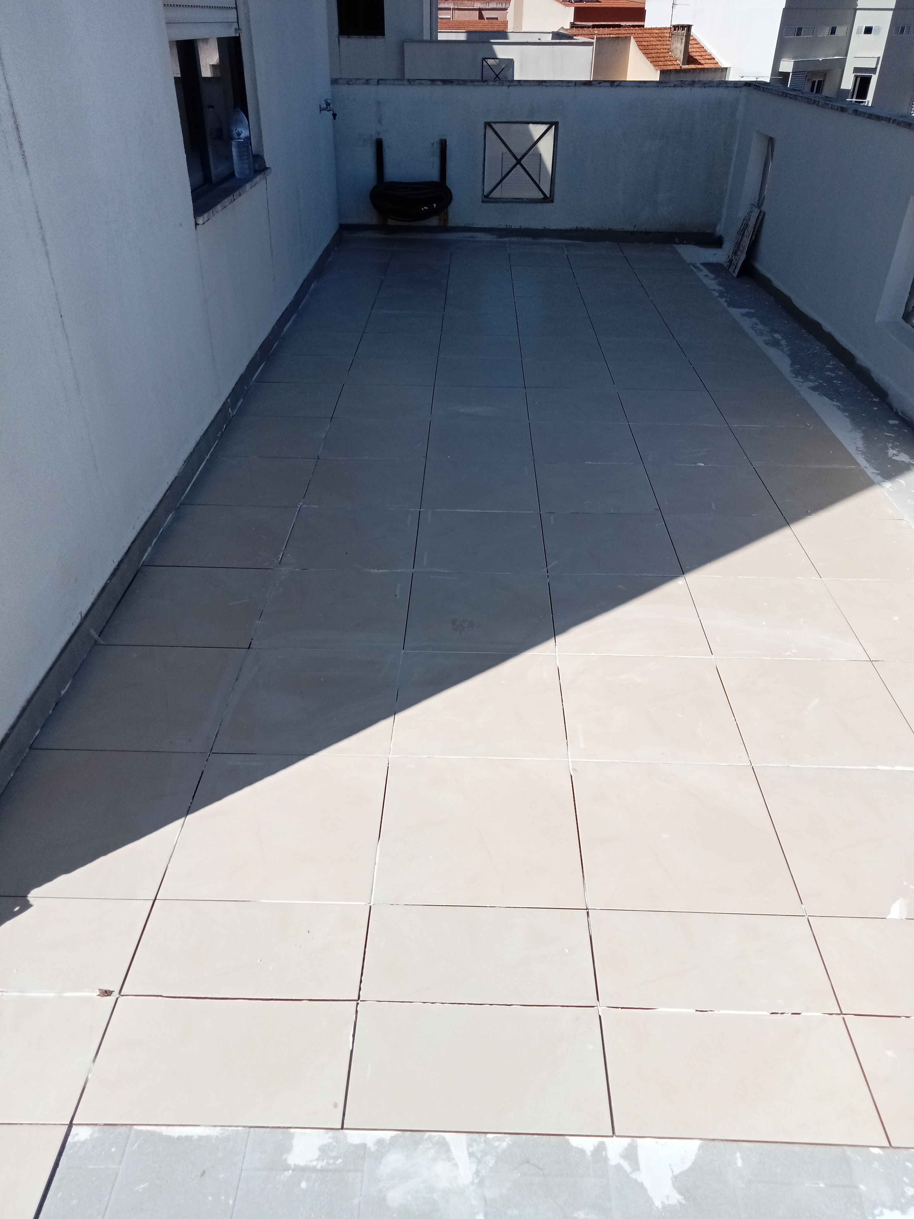 Aplicação de pavimento ceramico Aplicação de pavimento ceramico